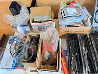 Overview of boxed and loose pumps, rotary tool, wrench case, hardware boxes