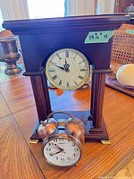 Front view of both clocks showing size and design