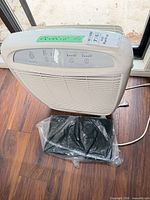 Top and front view of Whispure 510 air purifier showing controls and size label