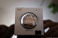 Reverse of 1917 large cent in flip showing date and Canada legend