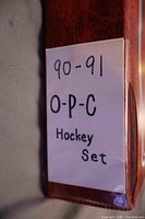 Binder spine showing handwritten label 90-91 O-P-C Hockey Set