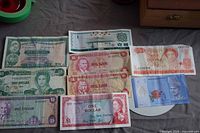 Group shot showing all nine banknotes laid out