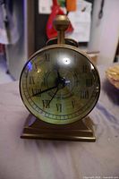 front view showing dial and pedestal base