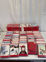 Front view of all 71 sealed card packages arranged on table