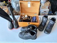 All footwear pairs, wooden box and contents overview