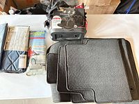 All items overview: quilted protector, Sno-Off cover, seat covers, floor mats