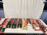 Overview of all packages of greeting cards and gift bags laid out on table