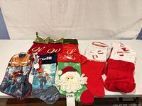 Group shot of all thirteen stockings on table