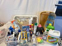 Group shot of all cleaning supplies and baskets