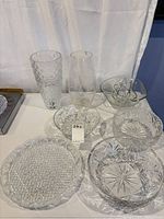 Group shot of all glass and crystal pieces on table