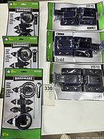 All six sealed latch sets laid out, three spear ring and three flip style