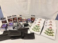 Group shot of all boxed lights, visor pouches, and cupcake stand boxes