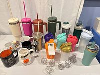 All items grouped: tumblers, shaker bottles, mugs, whisk balls