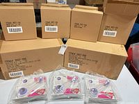 six shipping cases and three packaged Wilton circle cutters visible