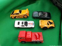 Group shot of five toy vehicles