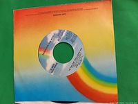 Record in MCA rainbow sleeve showing Oh Sheila/I’m The One Who Loves You label