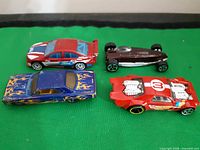 Four cars overview on green background