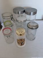 Group shot of all seven jars and shakers