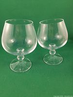 Pair of crystal snifters front view