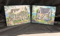 Both Susan Rios cottage garden paintings side by side