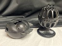 Both cast iron items side by side