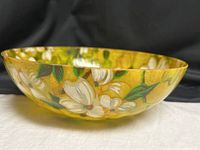Side view of yellow fiberglass bowl with floral pattern