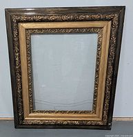 Full view of empty antique frame showing overall size and glass