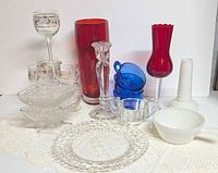 All 16 assorted glass pieces grouped together