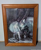 Full view of framed musician print showing frame and artwork