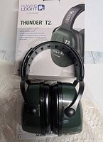 Box front and earmuffs shown outside packaging