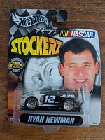 Front of sealed Hot Wheels Stockerz Ryan Newman #12 package