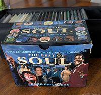 Outer box of The Best Of Soul 20-CD collection with additional CDs visible in background carry case