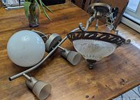 All three fixtures laid out on table