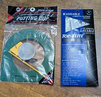 Package front of putting cup and glove together