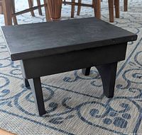 Top view of black chalk-painted wooden step stool