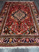 Full view of handmade Arak Lilihan rug showing entire design and fringe