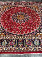 Full view showing entire rug and border