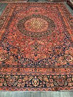 Full view of rug showing entire field and borders