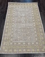 Full view of entire rug showing pattern and colors