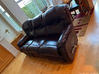 front angled view showing leather upholstery and seating