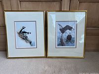 Both framed prints side by side