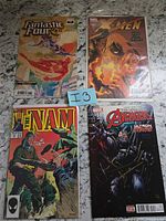 All four comics laid out for overview