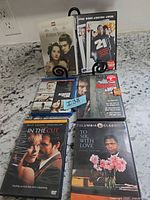 All six DVD/Blu-ray cases arranged on countertop