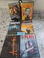 Front view of six DVD cases displayed