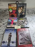 Front covers of six DVD cases