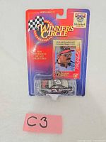 Front of sealed Winner's Circle package showing die-cast car and card
