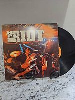 Front of H.P. Riot album jacket with vinyl