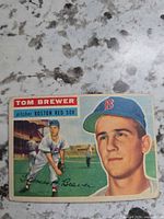 Front of 1955 Topps Tom Brewer card showing player portrait, action image, team and player name