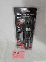 Front view of sealed Benchmark 14-in-1 ratcheting screwdriver set