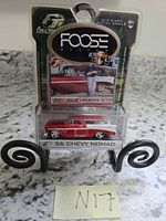 Front view of packaged Foose Design 56 Chevy Nomad die-cast car